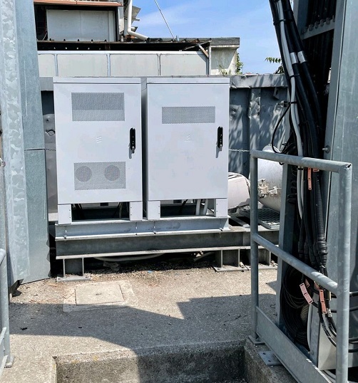 Two outdoor enclosures at rooftop